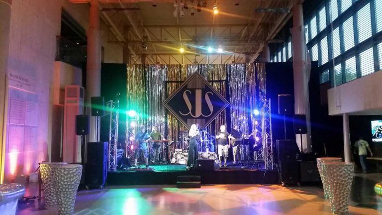 Prom stage backdrop with mylar curtain and custom foam logo sign_sm